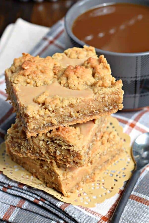 Peanut Butter Revel Bars are a sweet, chewy cookie bar, perfect for potlucks, holidays, and bake sales. Also freezes well for later!
