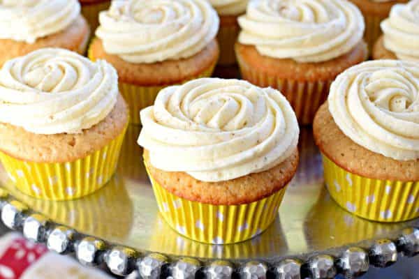 These Eggnog Cupcakes are made from scratch with my favorite spice cake and topped with creamy eggnog frosting. The perfect holiday treat!