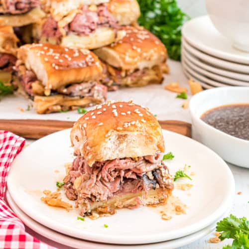 There’s nothing better than beefy, cheesy hand-held sandwiches dipped in buttery au jus. These irresistible French Dip Sliders are the ultimate game day food.