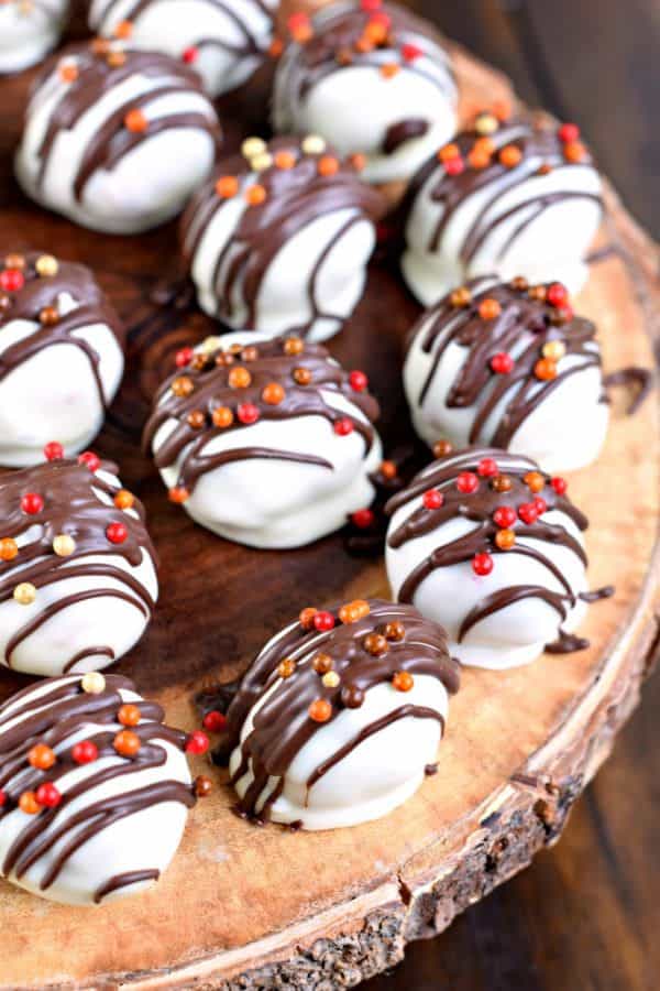 Red Velvet Cake Balls with cream cheese frosting, dunked in sweet white chocolate are the perfect Fall treat! Endless possibilities!