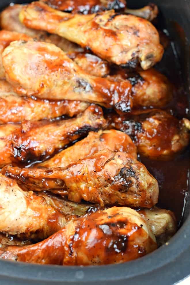 BBQ chicken legs in a crockpot.