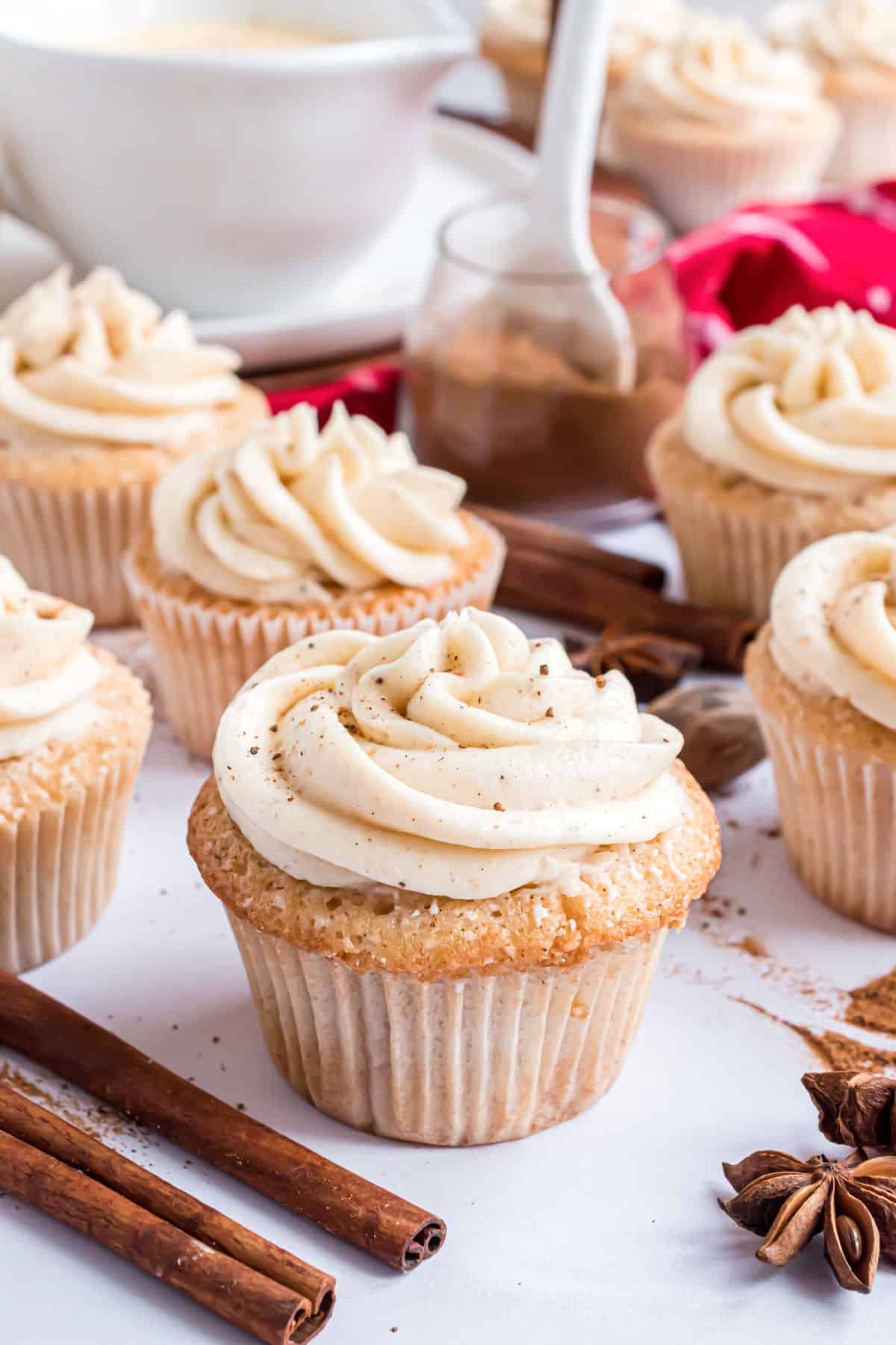 Cupcake with frosting and fresh nutmeg.