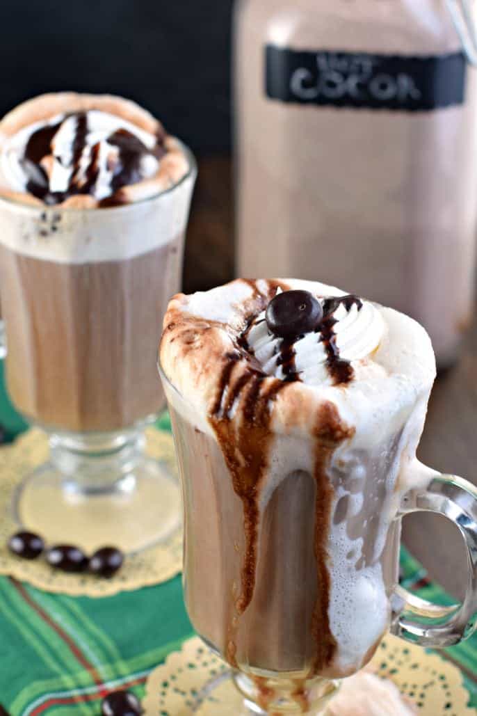 Mocha Latte with whipped cream and chocolate sauce.
