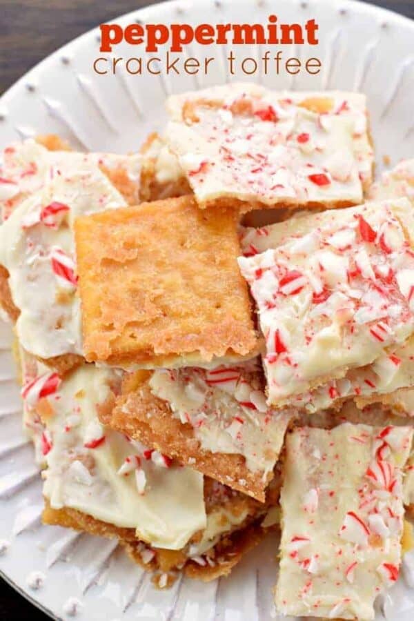 This Peppermint Cracker Toffee is ridiculously easy and delicious. Crisp, buttery toffee topped with white chocolate and peppermint candy!