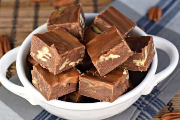 Turtle Fudge is made with a rich, chocolate base and swirled with caramel and packed with crunchy pecans!