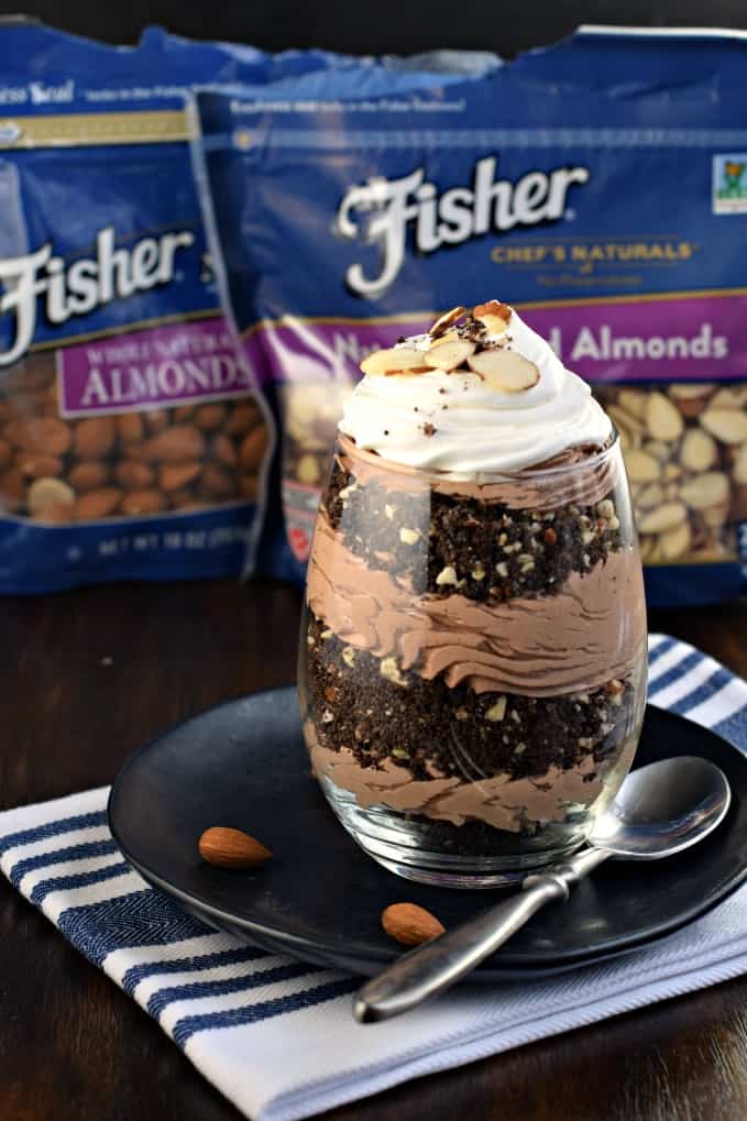 Beautiful layered Chocolate Almond Cheesecake Parfait! Chocolate sandwich cookies with almonds to create a crunchy crust, with a creamy chocolate cheesecake! Perfect for two!