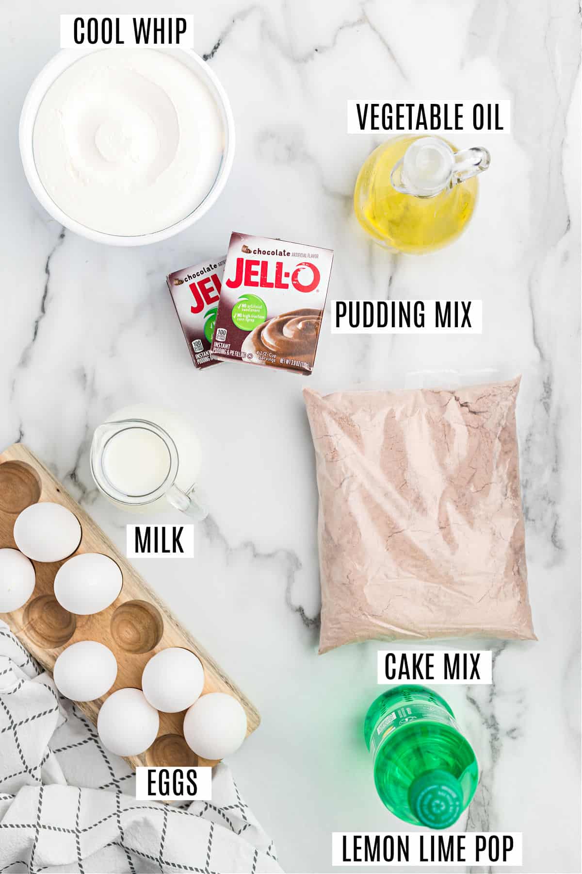 Ingredients needed to make chocolate cupcakes with chocolate pudding frosting.