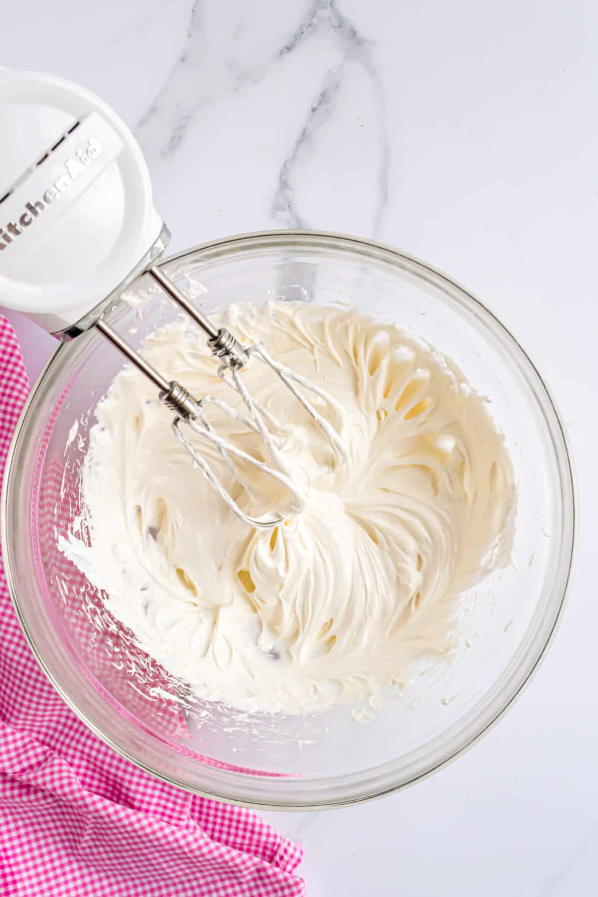 Fruit dip blended in a clear glass bowl.