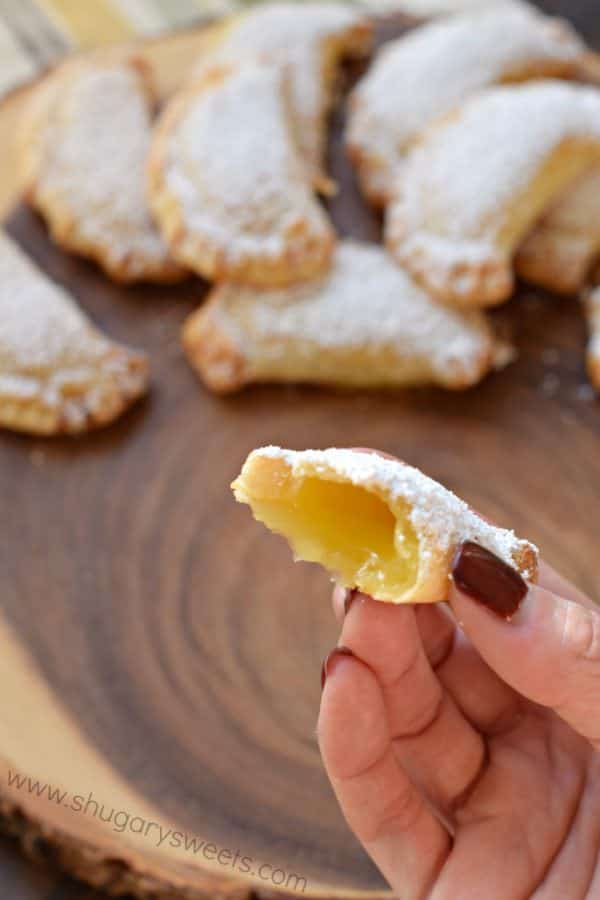 Lemon Hand Pies: flaky hand pies with a sweet lemon filling! Don't forget the dusting of powdered sugar on top!
