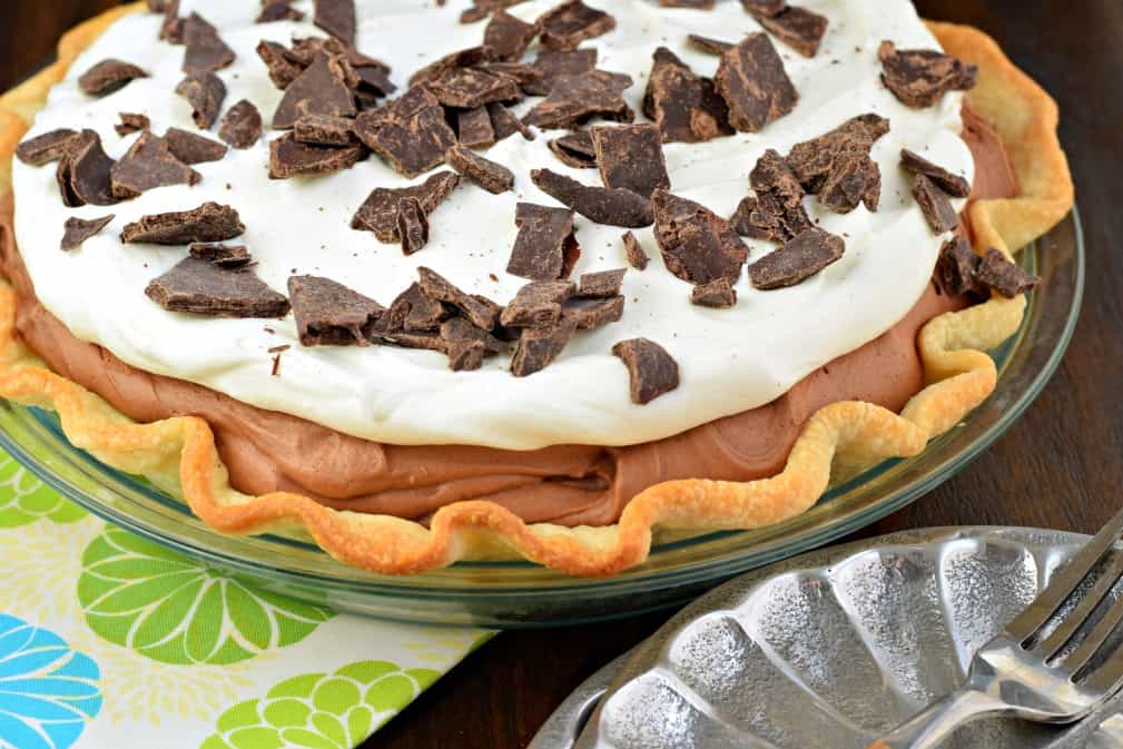 French silk pie topped with chocolate chunks.