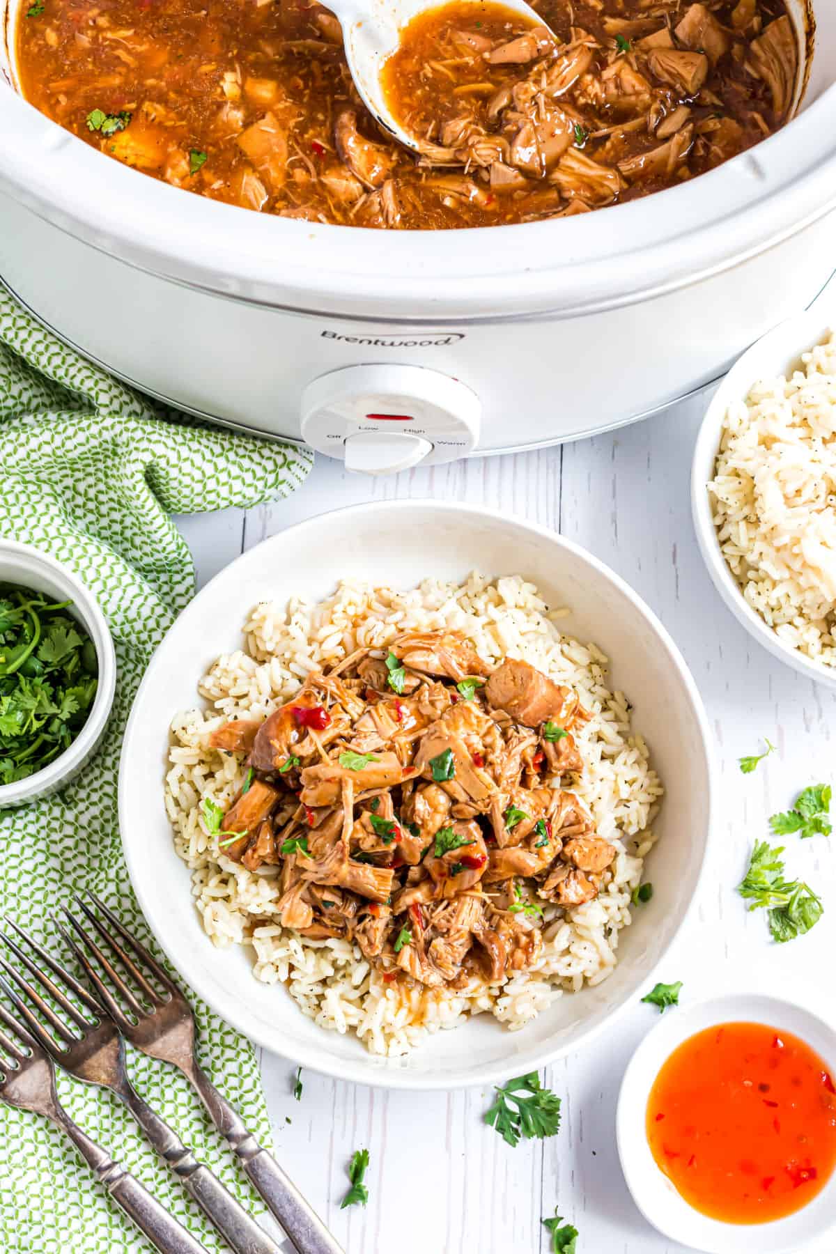 Bowl with rice and sweet chili chicken on top.