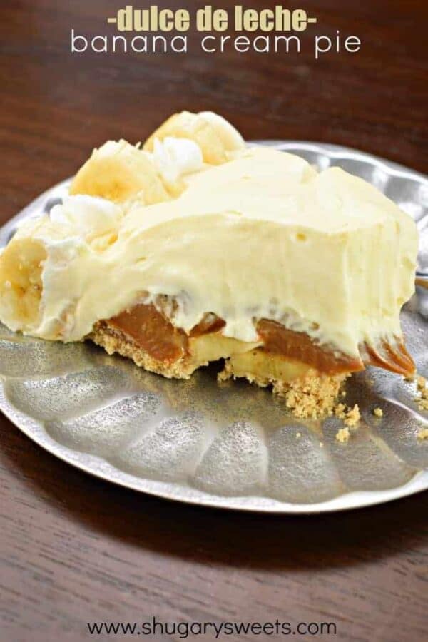 This Dulce de Leche Banana Cream Pie recipe has it all! Graham Cracker crust topped with dulce de leche and bananas with a no bake banana cheesecake filling!