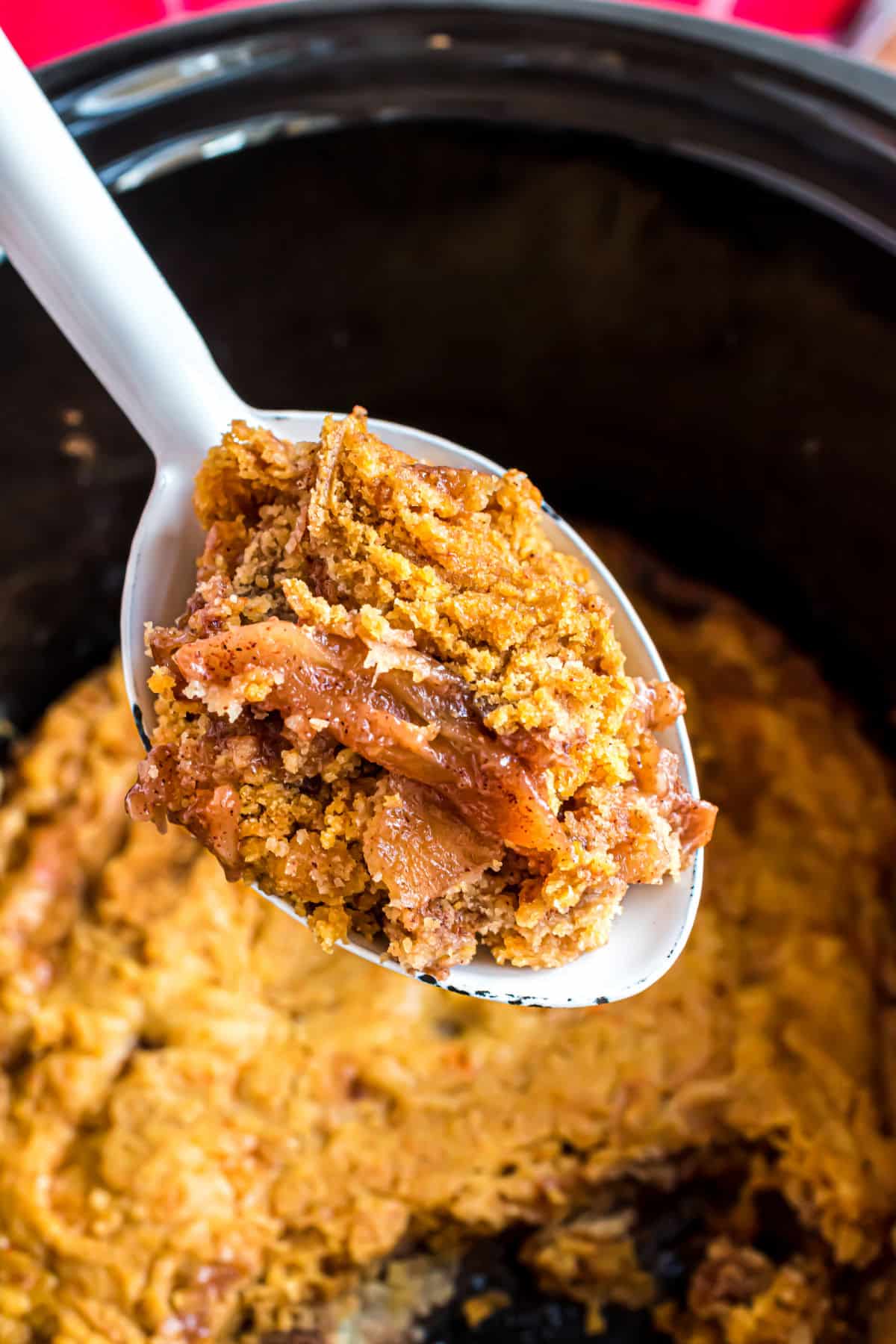 Spoonful of apple cake from the slow cooker.