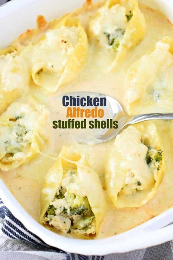 You'll love these easy, freezer friendly Chicken Alfredo Stuffed Shells. The perfect weeknight dinner recipe with chicken, cheese, broccoli and alfredo sauce all stuffed in a pasta shell!