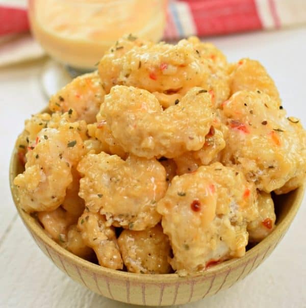 Quick and easy, baked, not fried, Bang Bang Shrimp is a delicious weeknight dinner idea with a tangy, yet sweet sauce! 