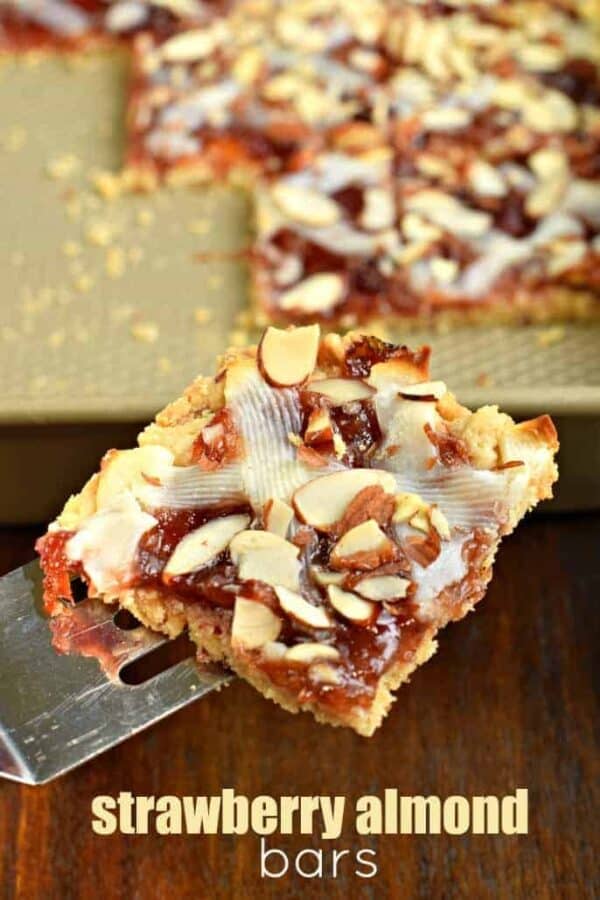 These Strawberry Almond Bars have a crunchy almond crust, chewy strawberry filling, and a creamy cheesecake topping. Perfect for holidays or weekend brunches!
