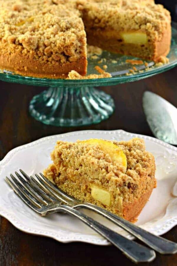Sweet Cinnamon Apple Crumb Cake with a dense layer of cake, cinnamon apple filling and topped with a crunchy cinnamon streusel! The perfect breakfast!
