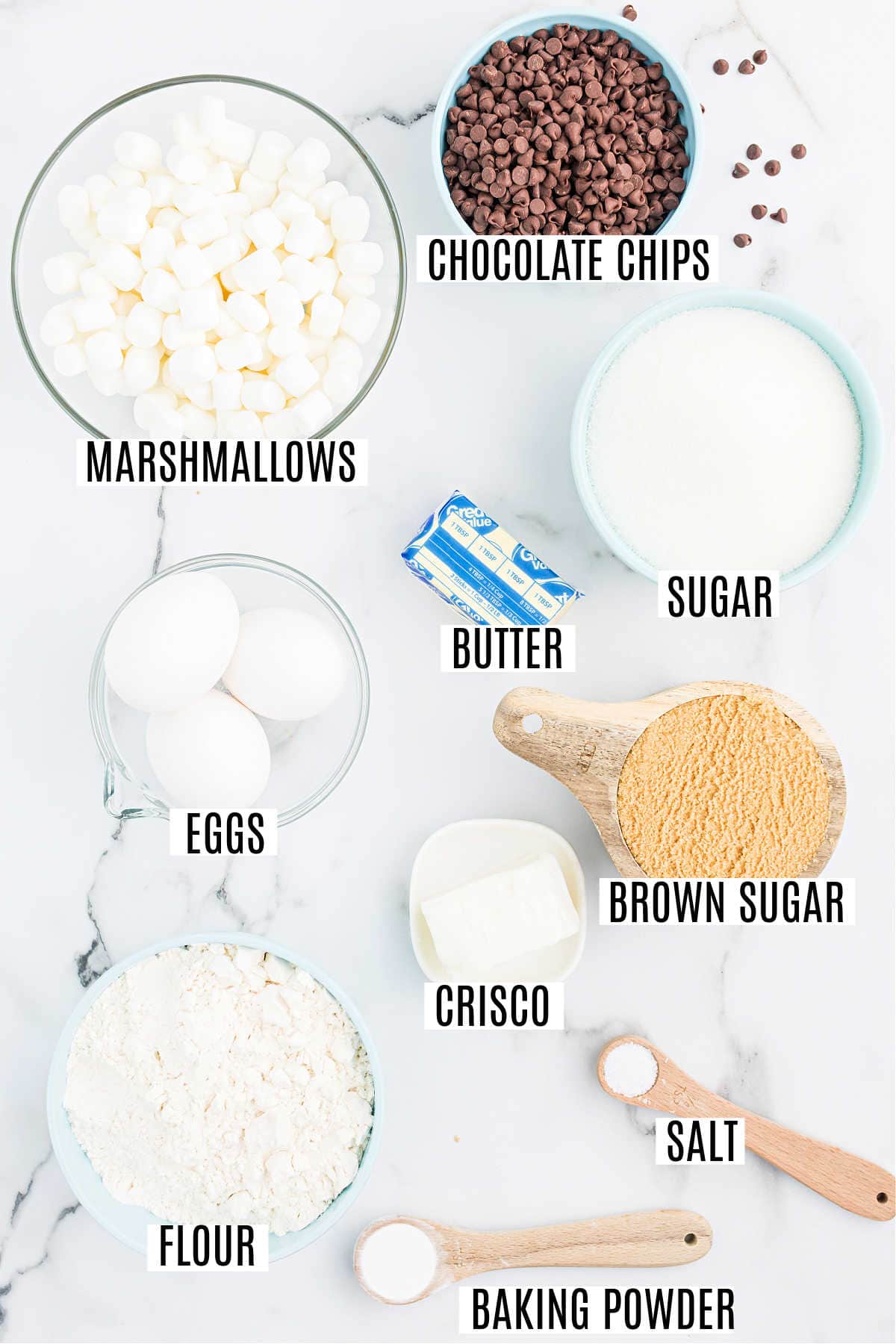 Bowls of marshmallows, chocolate chips, eggs, butter, sugar, brown sugar, Crisco, flour, salt, and baking powder—everything you need to make classic mud hen bars.