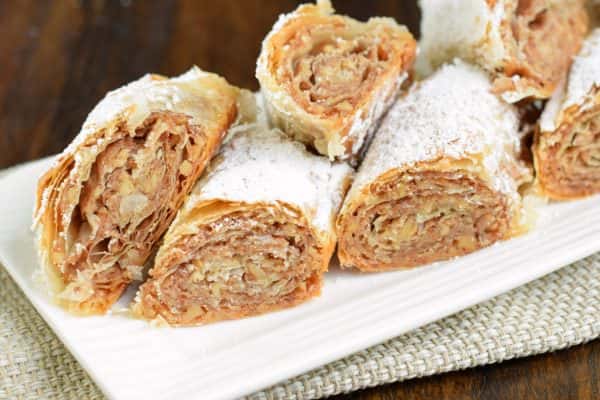 Sweet and flaky, this easy, rolled Russian Baklava will melt in your mouth! Phyllo dough, nuts, and sugar never tasted so good! @princesscruises #ComeBackNew #sponsored