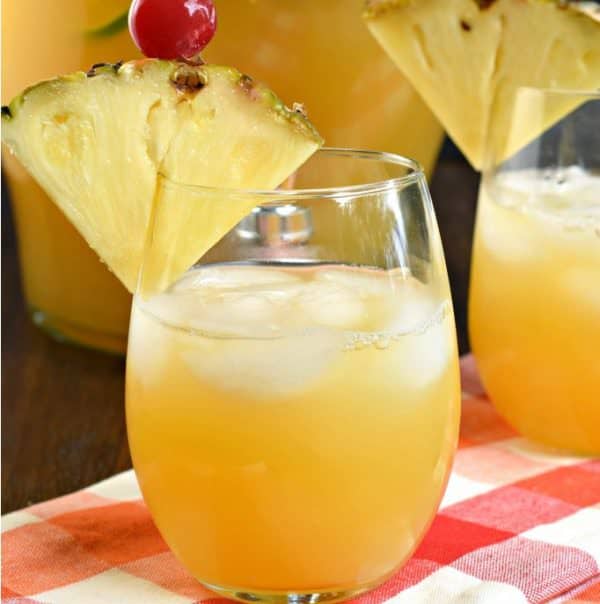 Pineapple Sangria is the perfect, refreshing summer drink! Packed with fruit, juice, and alcohol, you should whip up a batch today!