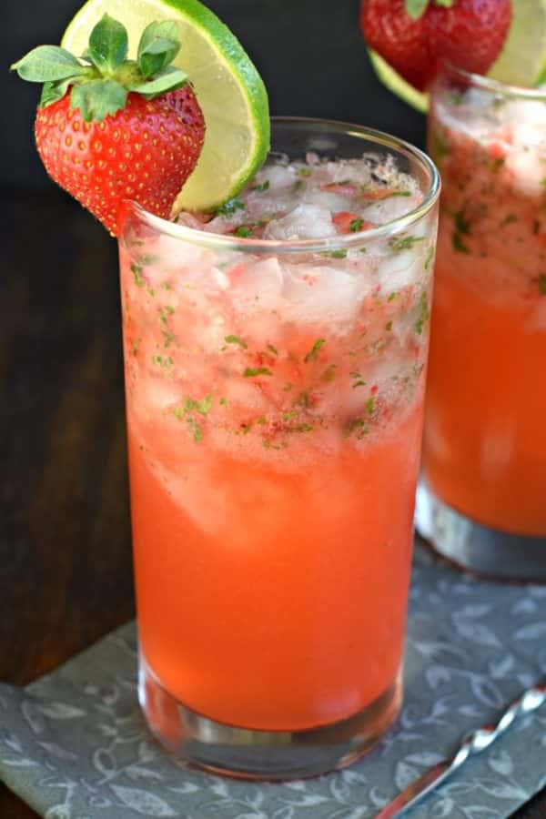 Serve up some Strawberry Mojitos at your next party and get rave reviews! Everyone will love this fruity, minty drink recipe!