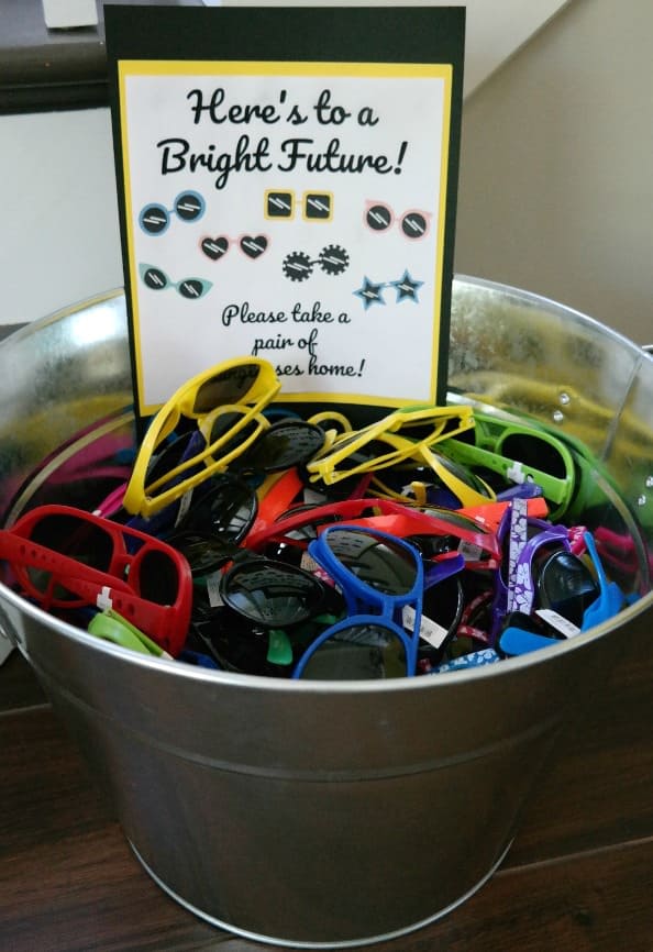 Here's to a Bright Future...take a pair of sunglasses home! Fun Graduation party idea!