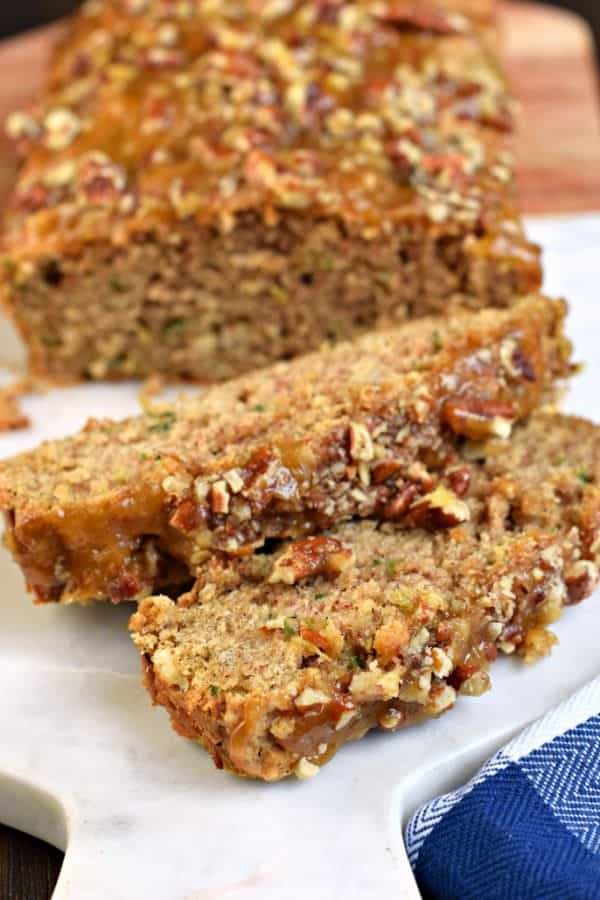 You'll love this Praline Topped Zucchini Bread with it's sweet, brown sugar topping. Sweet and salty, this bread makes TWO freezer friendly loaves! Perfect for sharing or saving for later!