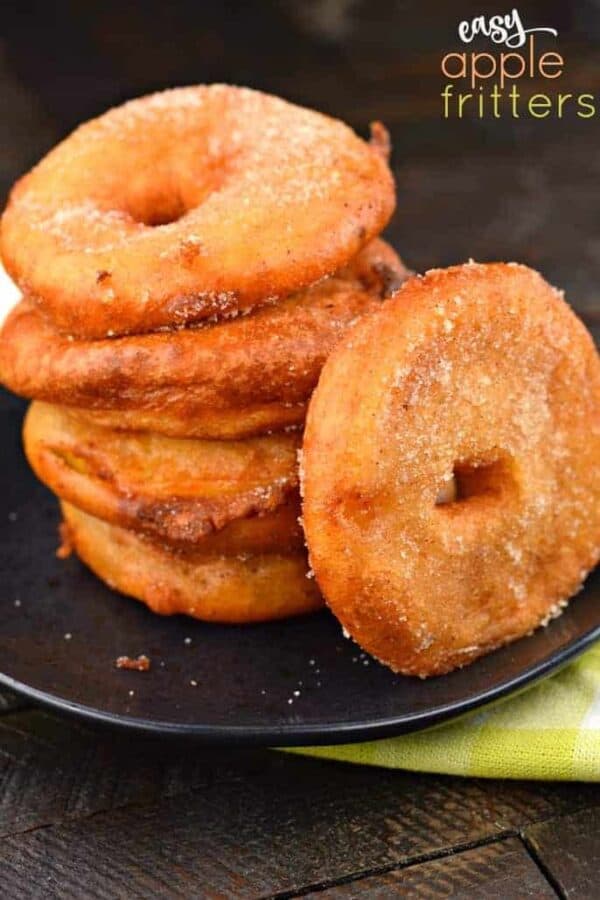 Delicious Apple Ring Fritters start with juicy apples and a buttermilk batter before frying to a golden brown! Then coat them in sugar and serve with your favorite caramel or chocolate dippers!