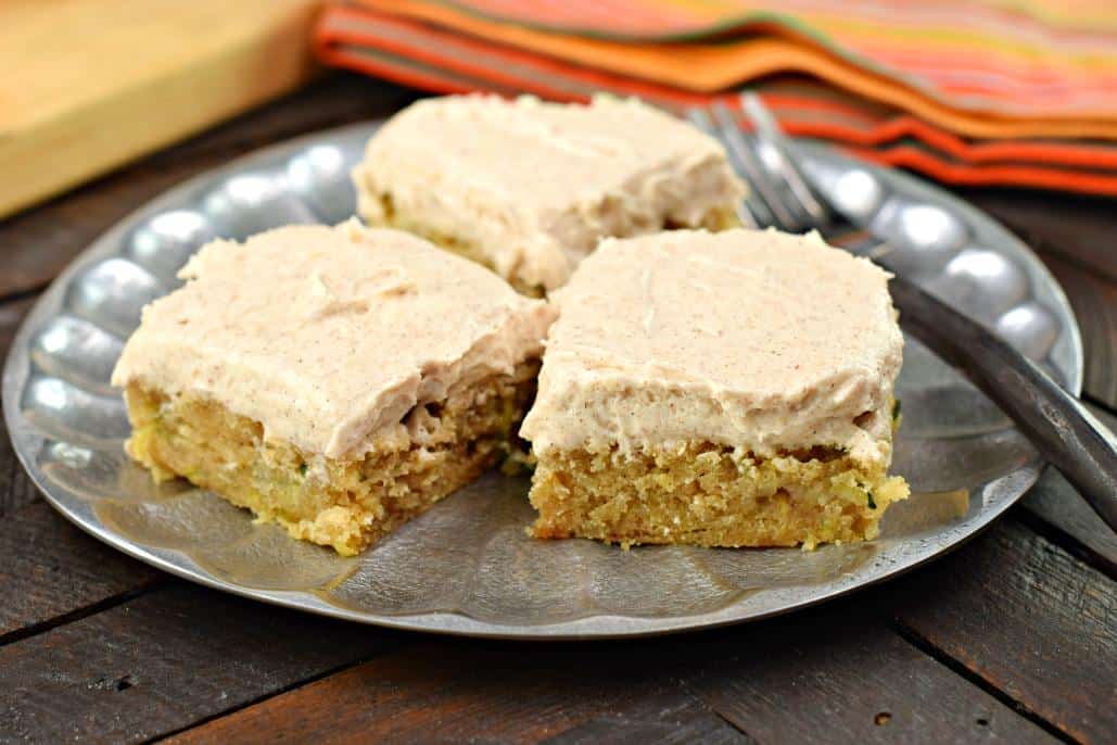 Easy and delicious, these chewy Cinnamon Frosted Zucchini Cake Bars are the perfect sweet dessert any time of year! Serve chilled for extra flavor!