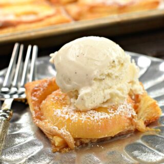 Apple tart topped with ice cream.