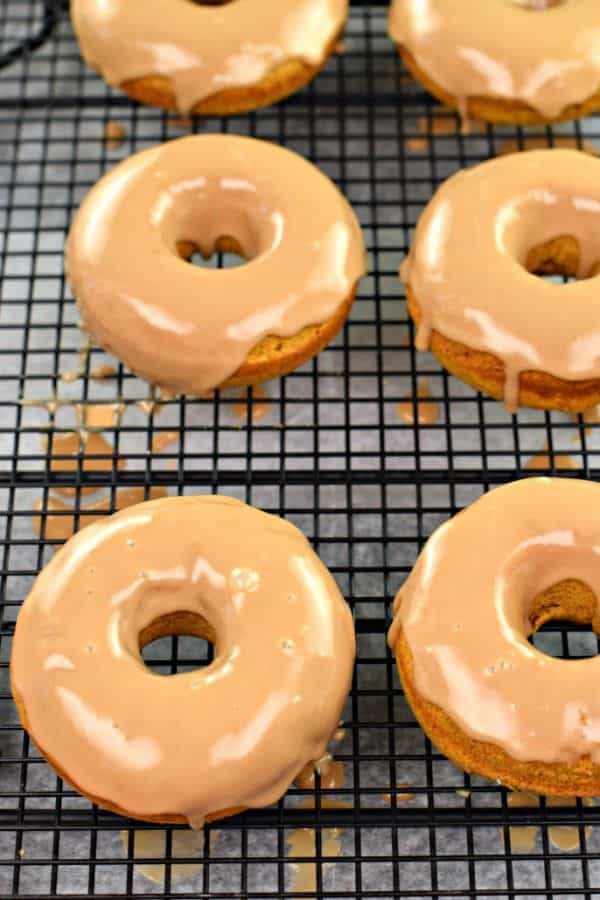 Soft pumpkin donuts topped with a maple glaze are exactly how I want to celebrate a fall morning. Bake a batch of Maple Glazed Pumpkin Donuts today!