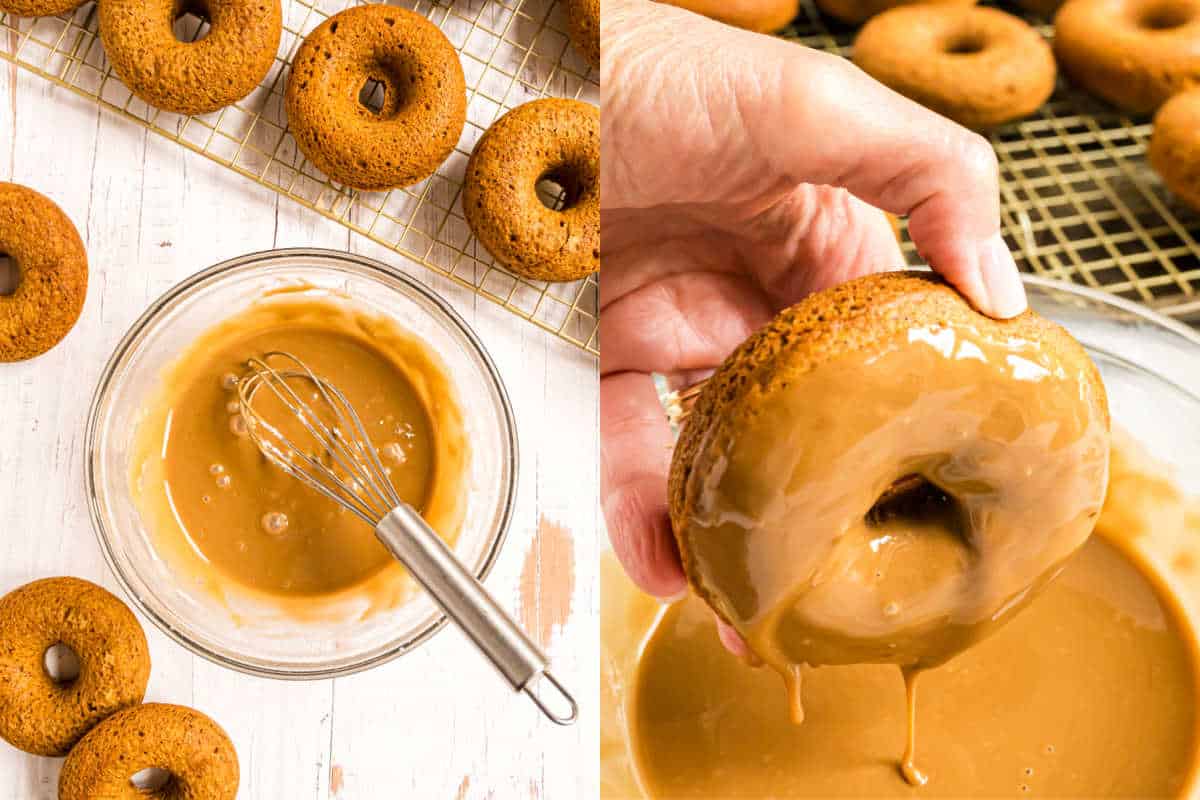 Maple glazed pumpkin donuts being dipped in caramel glaze, with donuts on a cooling rack and a bowl of glaze with a whisk.