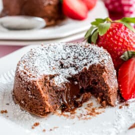 Rich and fudgy, these Individual Molten Chocolate Lava Cakes are the perfect recipe for dessert! These single portion cakes have a decadent chocolate flavor with a soft molten center. It's cake and a chocolate souffle all in one!