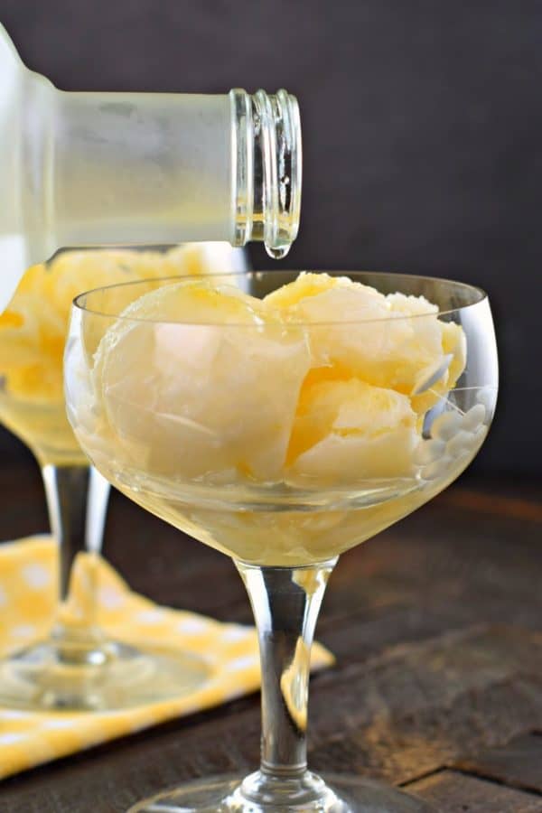 Smooth, sweet, and tart describe this deliciously, Easy Lemon Sorbet recipe! No ice cream maker needed! Add an optional shot of vodka for the perfect palate cleanser! #princesscruises #sponsored #lemon #sorbet #easyrecipe