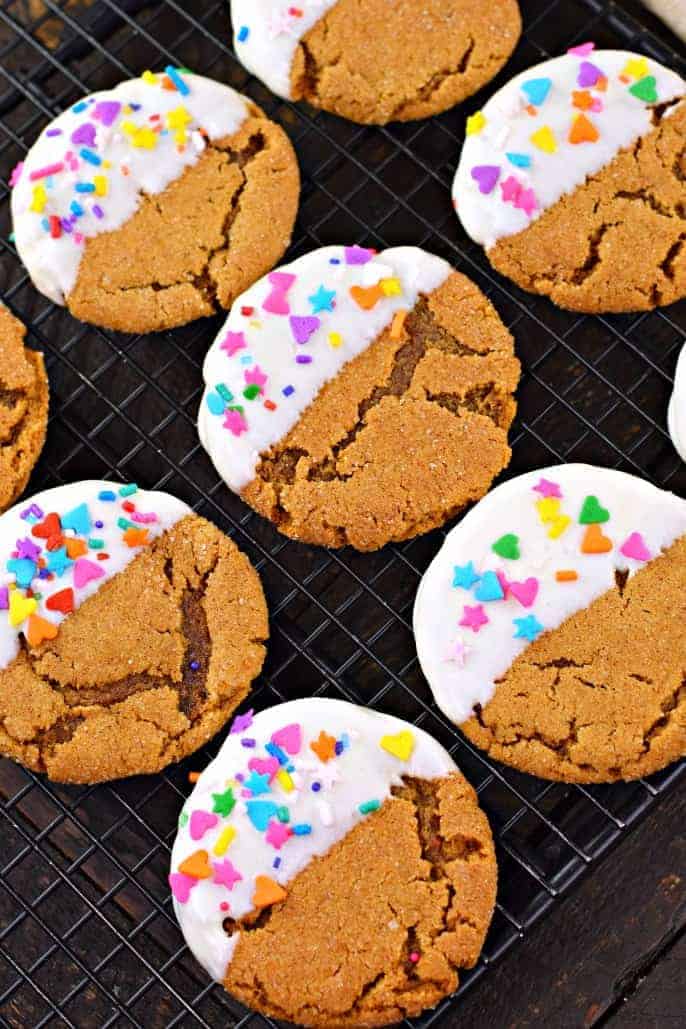 Chewy Gingerdoodle Cookies dipped in white chocolate with pastel sprinkles.