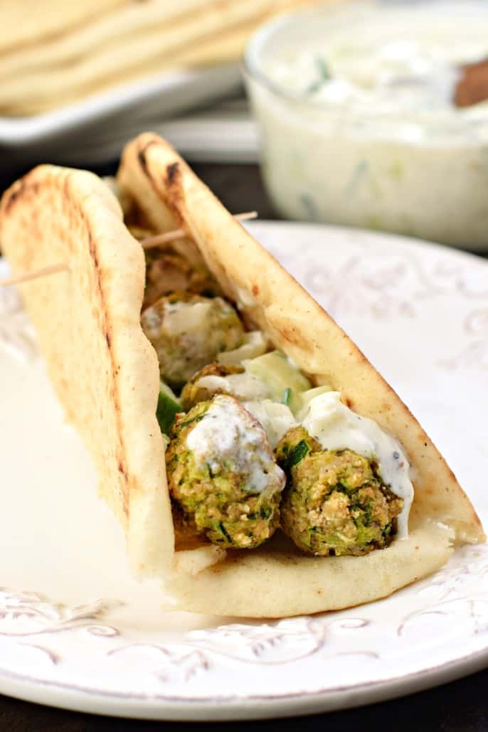 Pita bread with greek zucchini meatballs and tzatziki sauce.