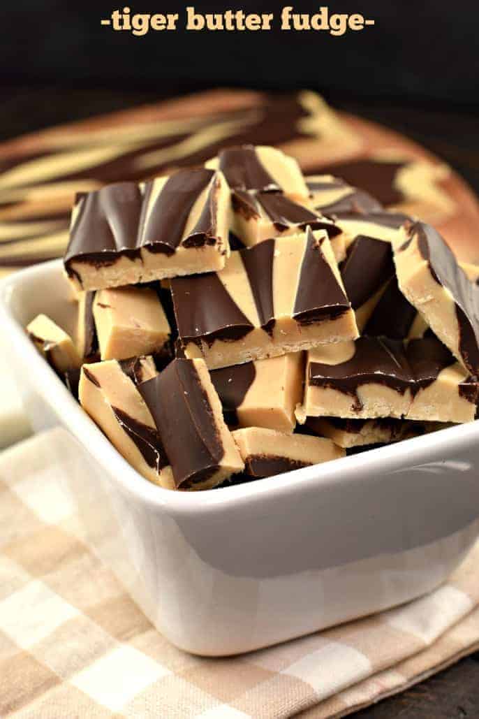 Chocolate peanut butter swirled fudge in a white bowl.