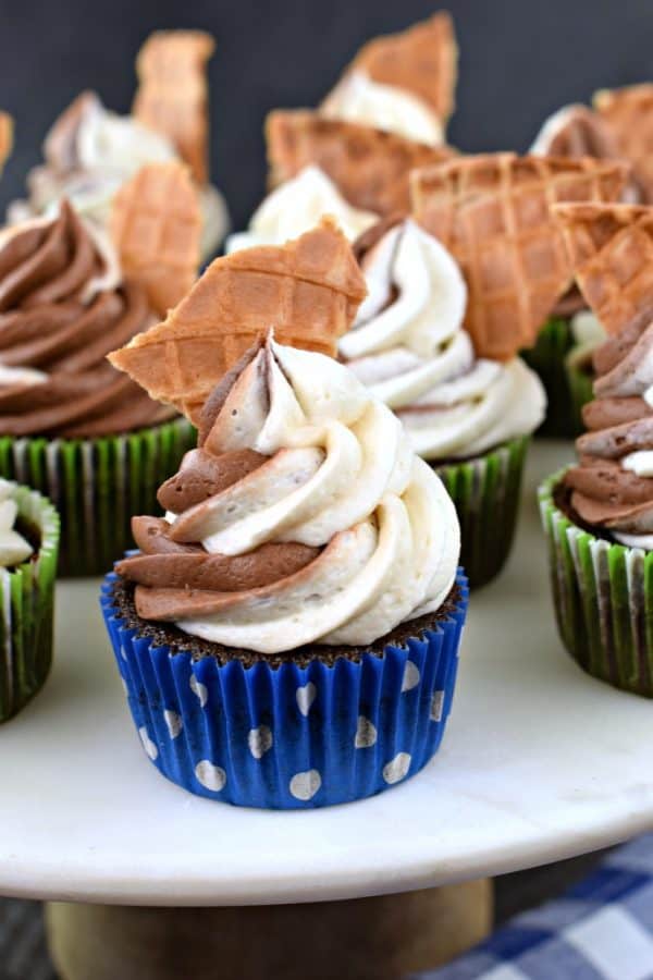 CHOCOLATE VANILLA SWIRLED FROSTING on a CHOCOLATE CUPCAKE in a blue wrapper with a WAFFLE CONE, CHOCOLATE, BUTTERCREAM FROSTING, FROM SCRATCH