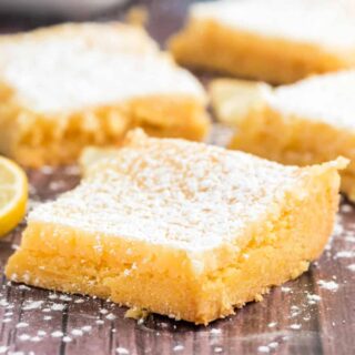 Turn your favorite Gooey Butter Cake into a Lemon dessert! Gooey Lemon Cake Bars make everybody happy and no one has to know you started with a box of cake mix!