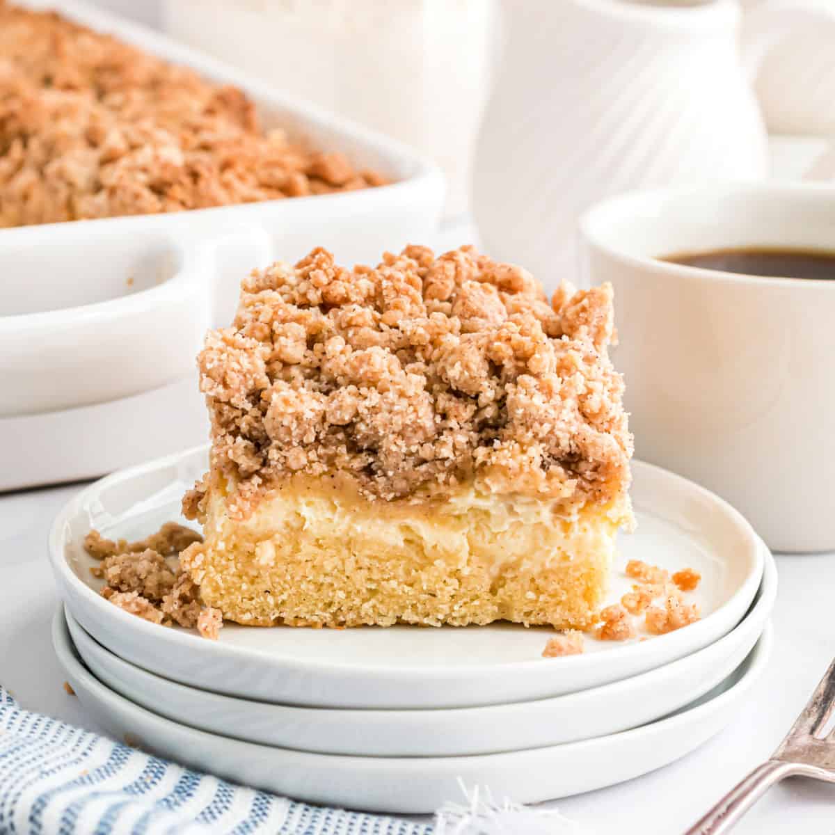 Thick Cream Cheese Coffee Cake has a layer of cheesecake and is topped with a crunchy Cinnamon Streusel. You'll love the moist texture with ribbon of cream cheese!