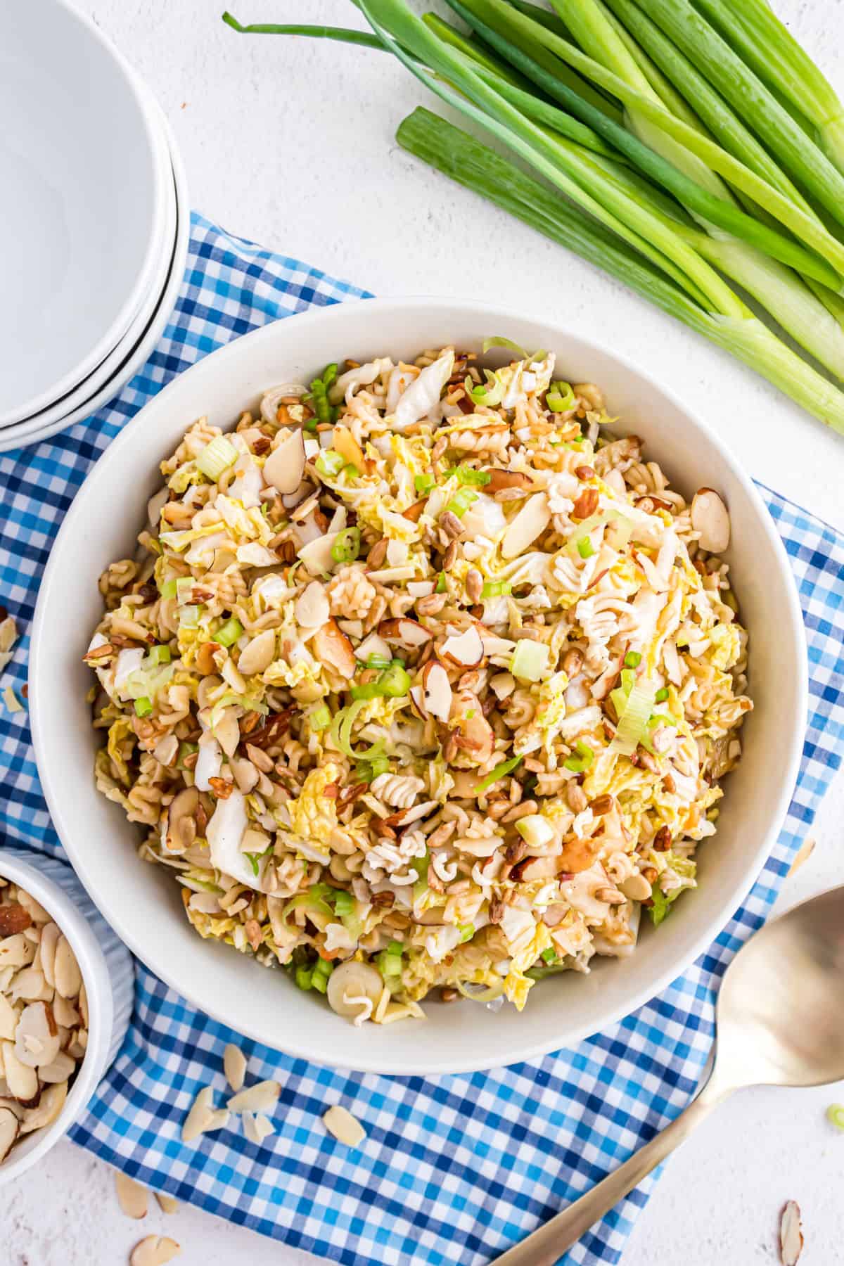 Ramen cole slaw in a white serving bowl.