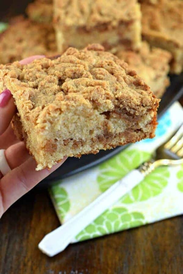 This Cinnamon Sour Cream Coffee Cake is a tender cake filled with a cinnamon swirl and topped with a delicious brown sugar streusel.