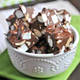 Looking for the easiest fudge recipe ever? This Easy Rocky Road Fudge is your answer! Every bite of this soft chocolate fudge is filled with chunky nuts and bits of marshmallow.