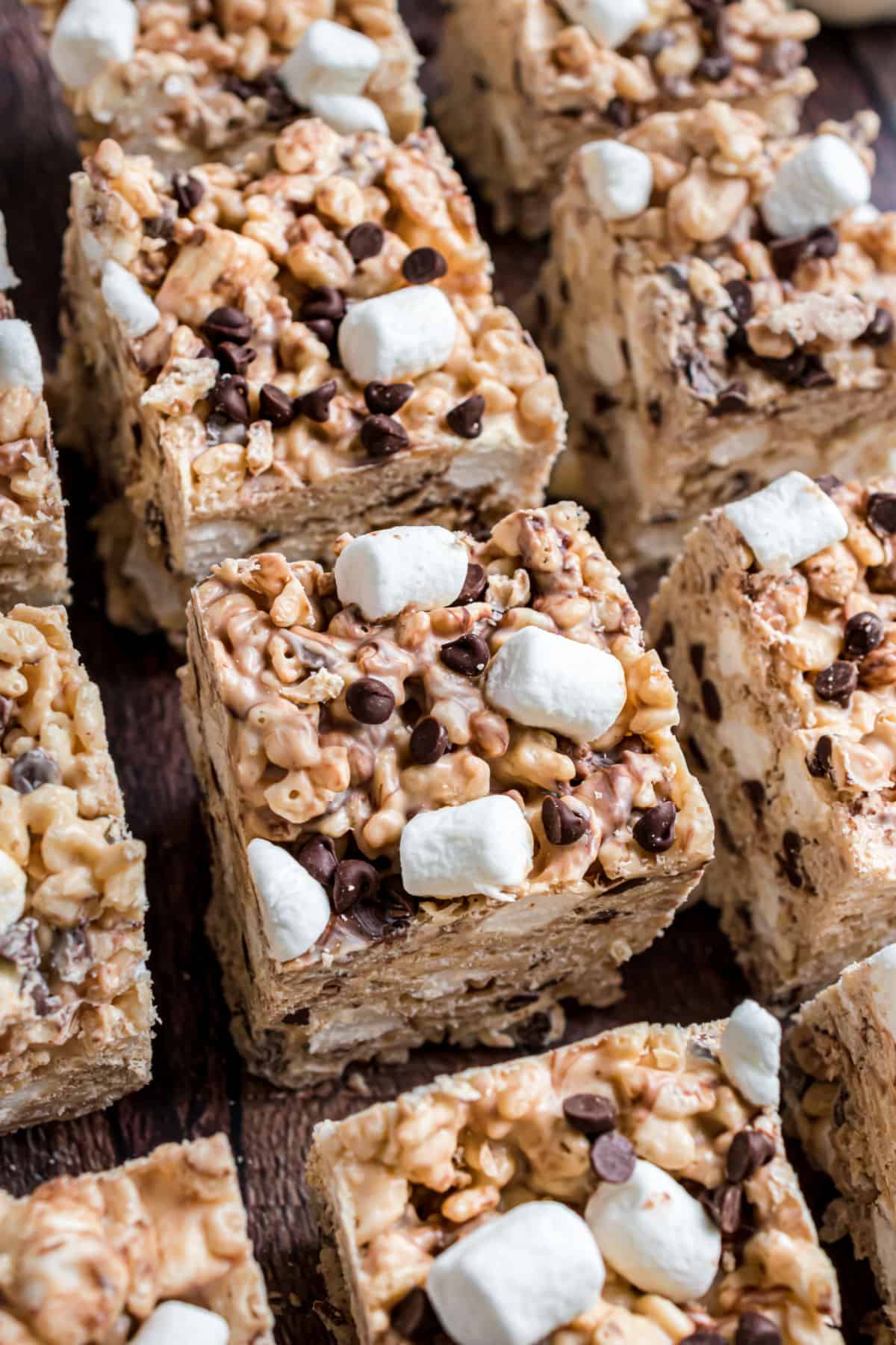 Thick peanut butter and chocolate rice krispie treats cut into squares.