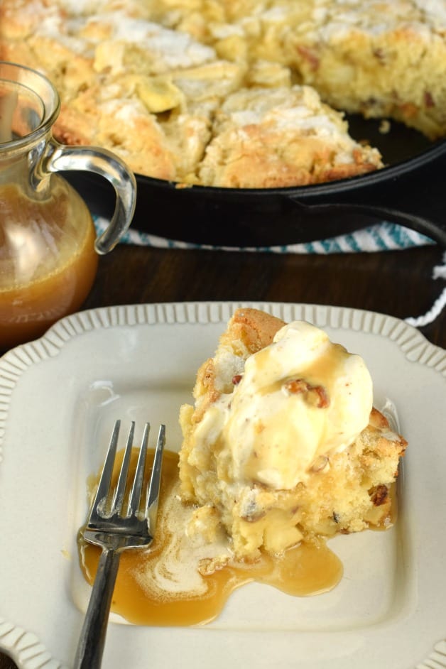 One slice of this Butter Pecan Apple Skillet Cake with Bourbon Caramel Sauce and you'll name this your favorite dessert ever eaten.
