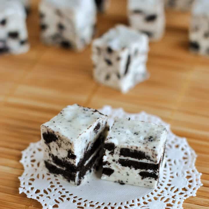 An easy, decadent Cookies and Cream Fudge recipe! This Oreo Fudge is packed with flavor and real Oreo cookie pieces. It's a delicious treat or homemade gift idea for any occasion!