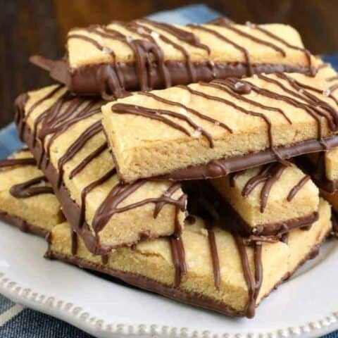 Buttery and delicious, these Dark Chocolate Peanut Butter Shortbread Cookies are the perfect dessert. Add a sprinkle of sea salt and your taste buds will thank you!