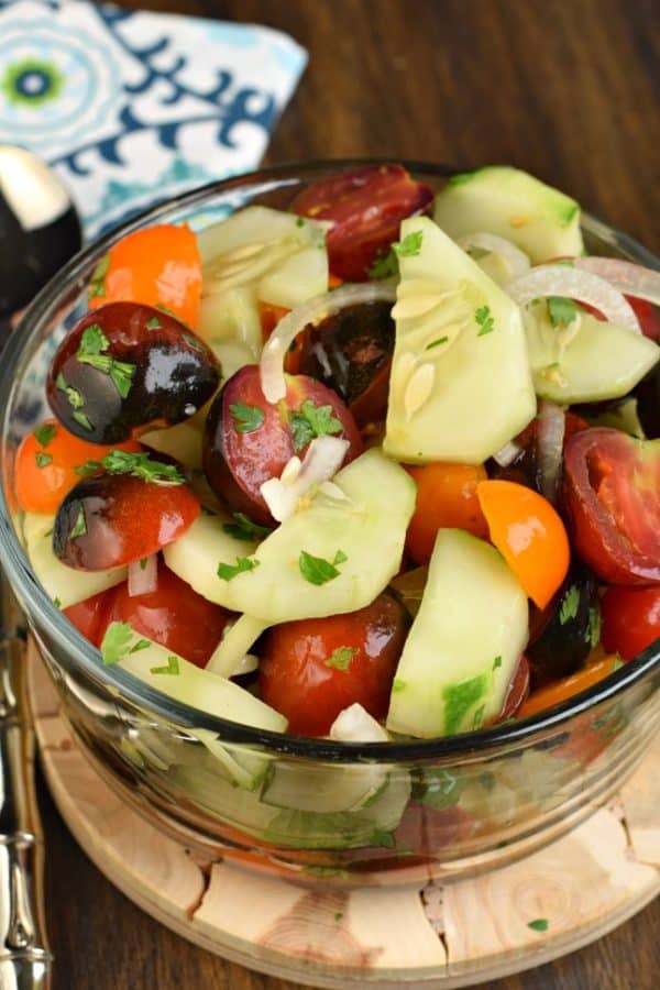 Healthy and light, this fresh Cucumber Tomato Salad is a delicious summer side dish!