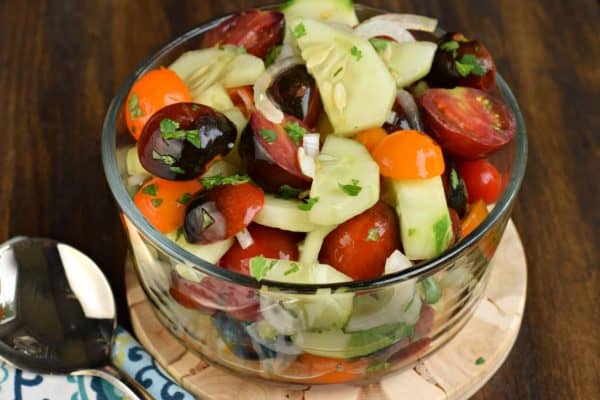 Healthy and light, this fresh Cucumber Tomato Salad is a delicious summer side dish!