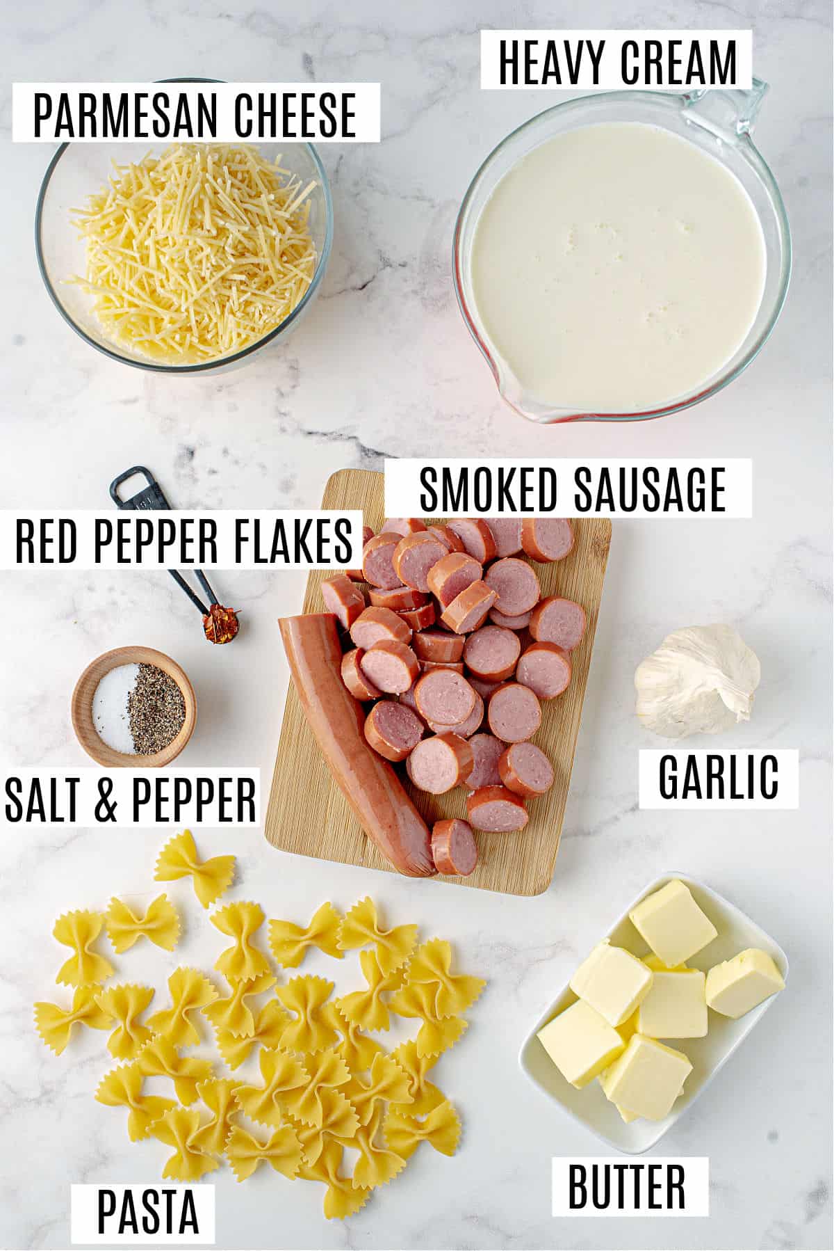 Ingredients needed for alfredo pasta with sausage.